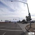 Tree leaning on damaged fence near I-10 on-ramp