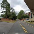 Woman with breathing issues at hospital parking deck