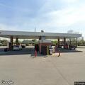 Man on crutches reports severe back pain at gas station