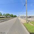 Car stuck on railroad tracks at First Avenue South