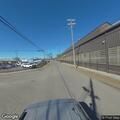 Person experiencing abdominal pain at industrial address