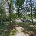 Person took photos of home and left yard