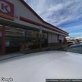 Person experiencing back pain at Circle K store