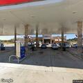 Vehicle damaged near construction site by Exxon