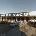Traffic stop at car wash on dark Ford Expedition