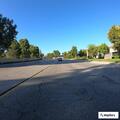Vehicle blocking lanes with large load on freeway