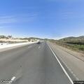 White Mustang blocking I-215 right lane