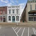 Vehicle hits pole on East Main Street