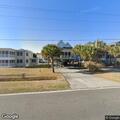 Dog possibly in distress at Surfside Beach home