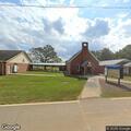 Train blocks railroad crossing near golf course