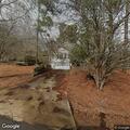 Possible fire with person running into woods