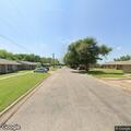 Person having a panic attack at mailboxes on Beauty Lane
