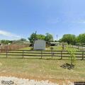 Dog reported malnourished in fenced front yard
