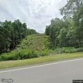 Car hits tree and goes down hill off Highway 69