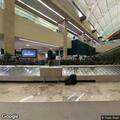 Person requires medical aid at airport terminal baggage claim