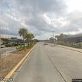 Person experiencing chest pains at airport cell lot