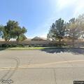 Person experiencing abdominal pain near Menifee