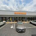 Officer conducting traffic stop at Elite Pawn