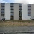 Person experiencing chest pains at motel laundry room
