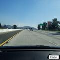 Sleepy driver in white truck on I-15