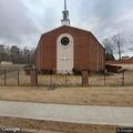 Person experiencing chest pain at church