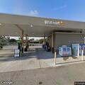 Vehicle hits tree at Walmart gas station