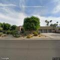 Person experiencing abdominal pain in Indian Wells