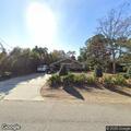Brush fire near propane tank at Dogwood Avenue home