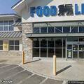 Two-car crash blocks Food Lion park entrance