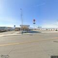 Person with chest pain at gas station