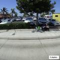 Person receiving medical aid at gas station in Westminster