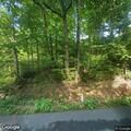 Tree blocking roadway on Pleasant Grove Road
