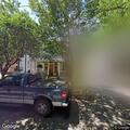 Gray Ford Fusion blocking car in driveway