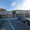 Car crashes into bagel shop, passengers trapped