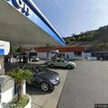Person found unconscious at gas station intersection