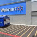 Police and medics check woman at Walmart