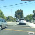 Reckless red sedan speeding on Hawthorne Boulevard