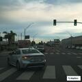 Solo motorcycle crash in front of Goodwill store