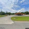 Unresponsive person with shallow breathing at gas station