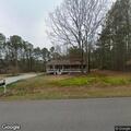 Person reported sitting in yard on Coppermine Road