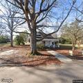 Tree removal and house damage on Oak Street