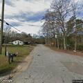 Car hits power pole causing downed power lines