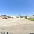 Two men fighting in parking lot on Highway 377