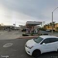 Unresponsive woman found in red sedan at gas station