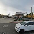 Unresponsive woman found in red car at gas station