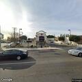 Person damaging drive-through window and parked cars