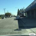 Vandalism suspect tagging gas station building