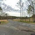 Female found laying on side of road near water tower