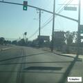 Driver drinking alcohol in white SUV on Van Buren