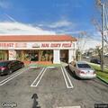 Woman yelling and hitting windows at pizza shop